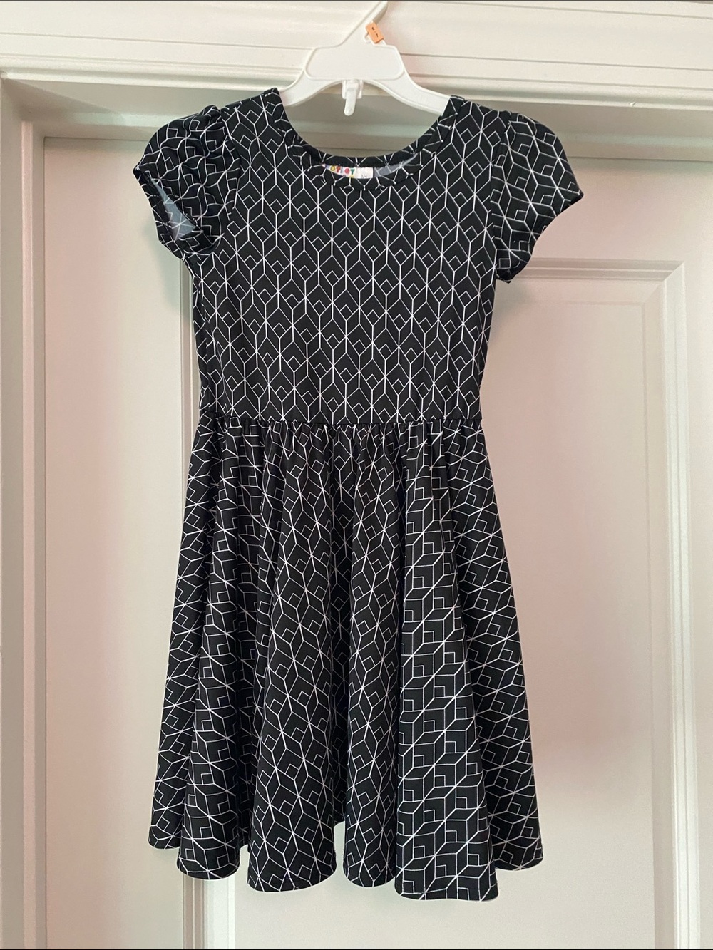 Girls' Black Geometric Fit & Flare Dress twirl 3/4
